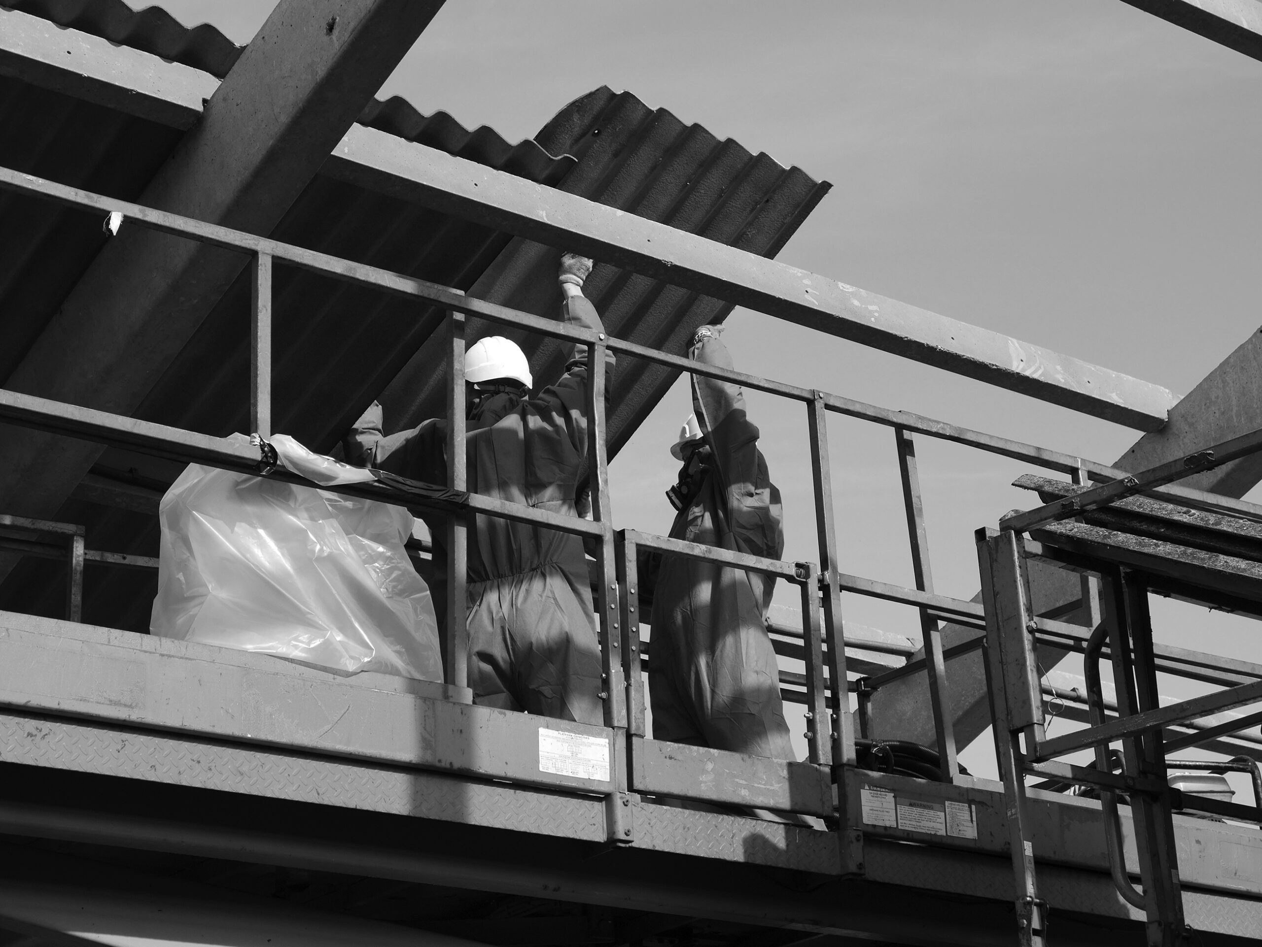 Licensed contractor performing asbestos removal in Auckland ceiling